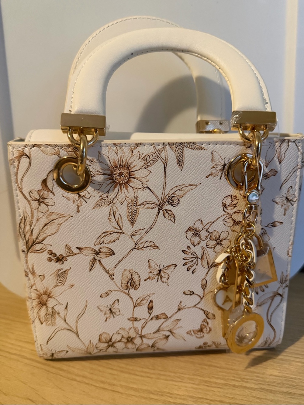 Aldo White Floral Satchel with Gold Charm